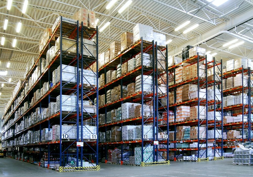 Warehouse racking stacked with pallets